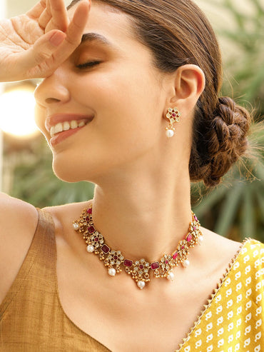 Rubans Women 22K Gold Plated Brass Metal Ruby Pink Stone Studded White Beaded Floral Necklace Set Jewellery Set