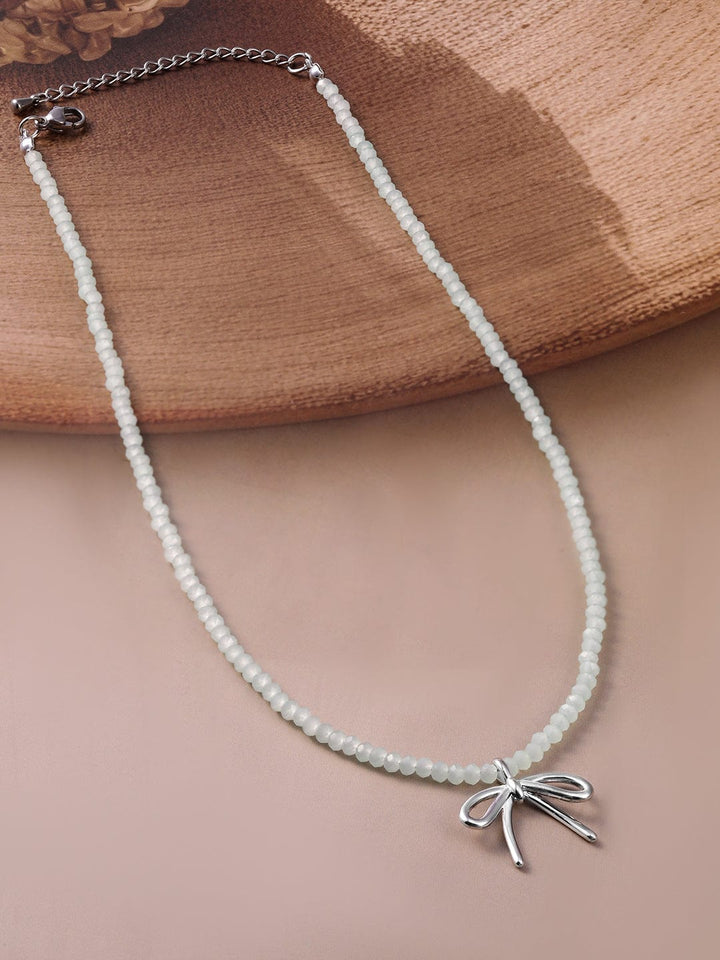 Silver Bow Pendant with White Bead Necklace Necklace