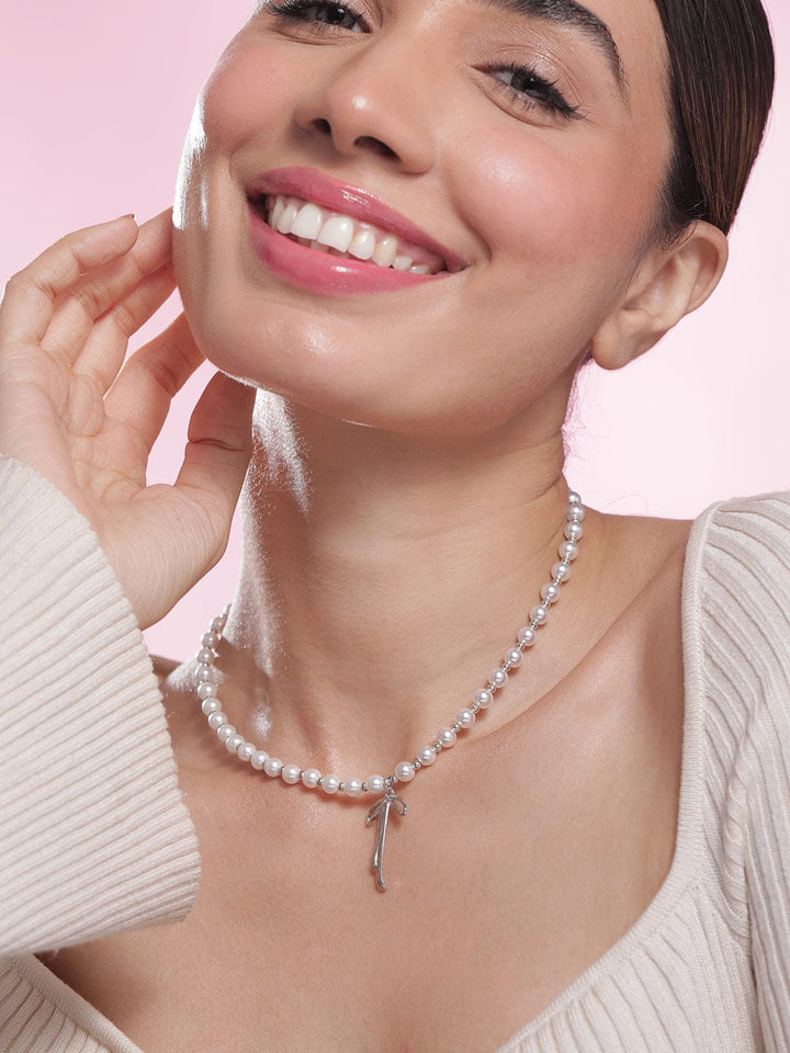 Silver Bow Pendant with White Pearl Necklace Necklace