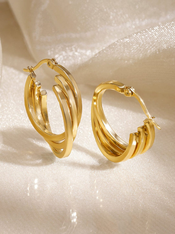 Sleek Twisted Golden Hoops Earrings