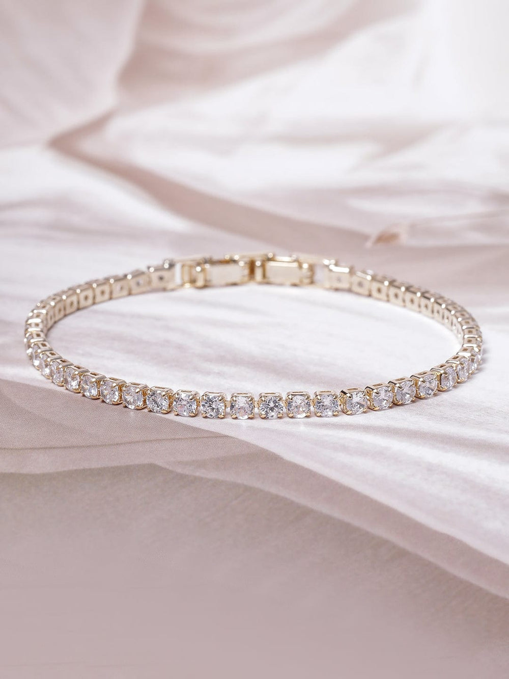 Voguish 22K Gold Plated AD & Cubic Zirconia Studded Delicate Tennis Bracelet Bangles & Bracelets