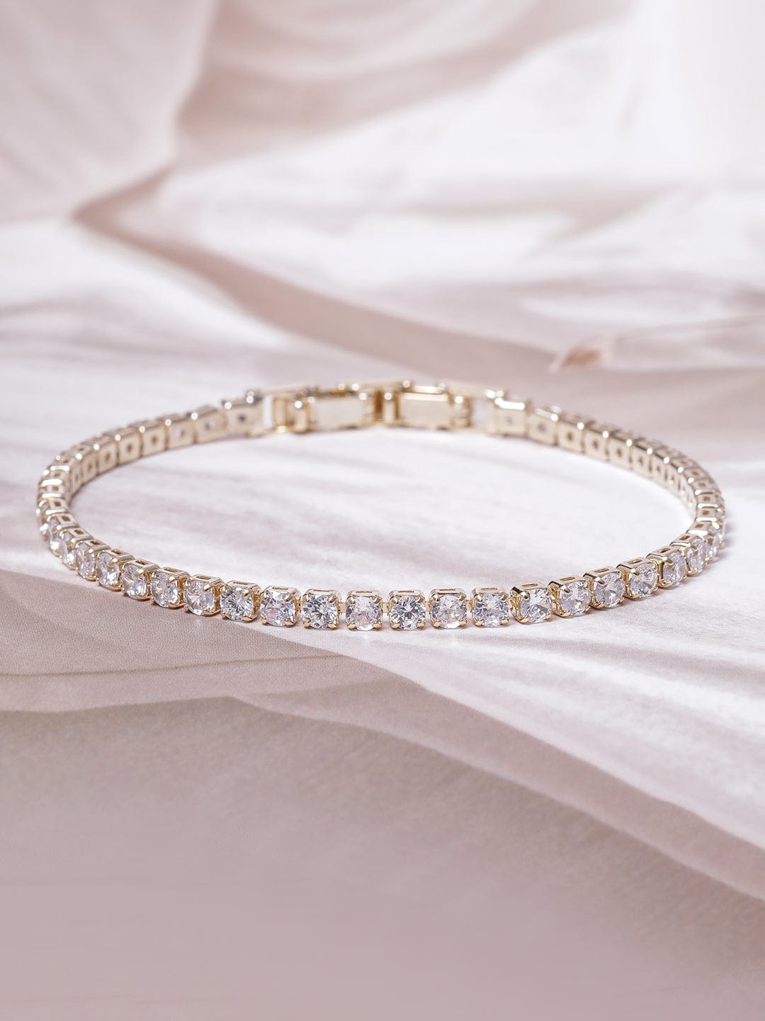 Voguish 22K Gold Plated AD & Cubic Zirconia Studded Delicate Tennis Bracelet Bangles & Bracelets