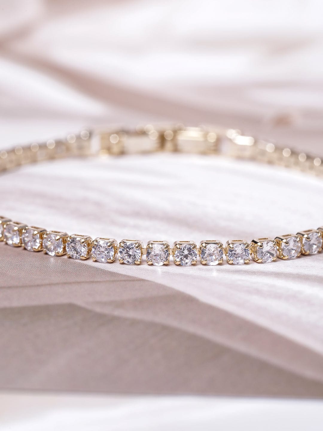 Voguish 22K Gold Plated AD & Cubic Zirconia Studded Delicate Tennis Bracelet Bangles & Bracelets