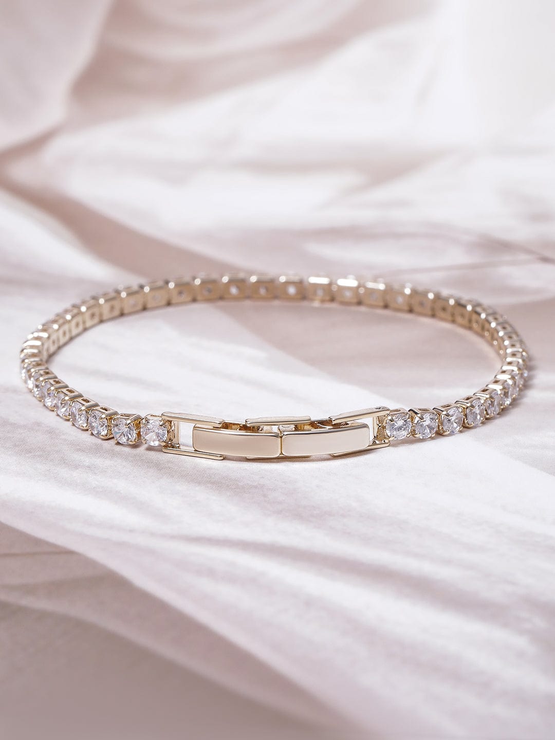 Voguish 22K Gold Plated AD & Cubic Zirconia Studded Delicate Tennis Bracelet Bangles & Bracelets