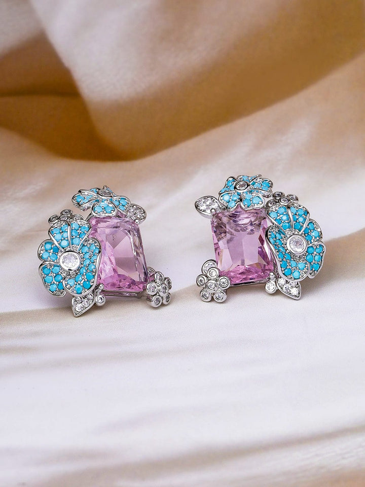 Voguish Rhodium Plated Blue Stone & Crystal Light Pink Zirconia Studded Floral Stud Earrings Stud Earrings