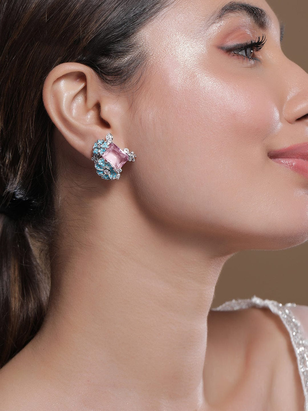 Voguish Rhodium Plated Blue Stone & Crystal Light Pink Zirconia Studded Floral Stud Earrings Stud Earrings