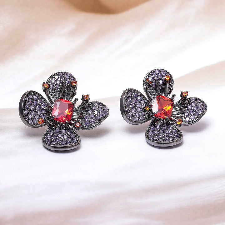 Voguish Rhodium-Plated Lavender, Orange & Ruby AD & Cubic Zirconia Studded Floral Stud Earrings Stud Earrings