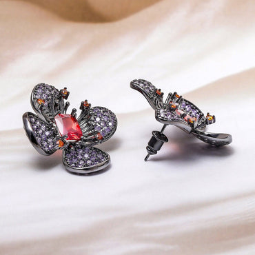 Voguish Rhodium-Plated Lavender, Orange & Ruby AD & Cubic Zirconia Studded Floral Stud Earrings Stud Earrings