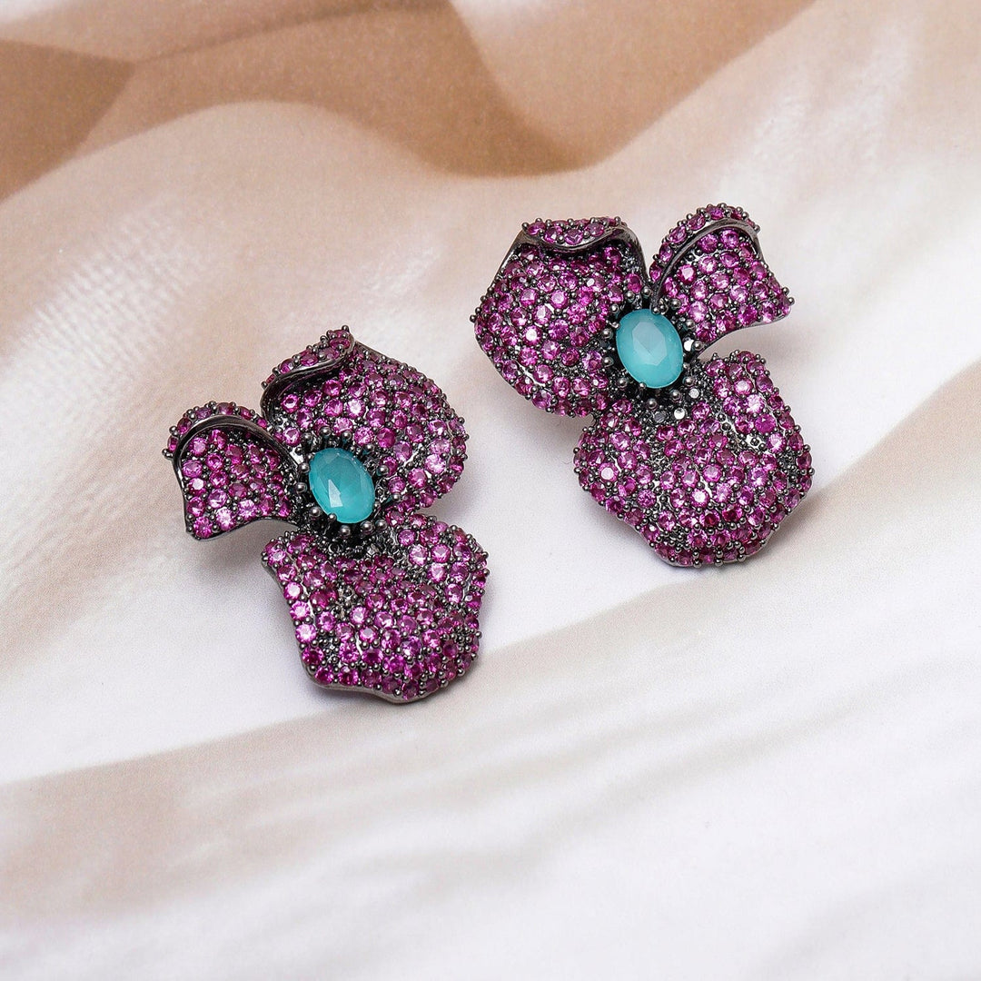 Voguish Rhodium-Plated Ruby Pink & Turquoise Blue AD & Cubic Zirconia Studded Oversized Floral Earrings Studs