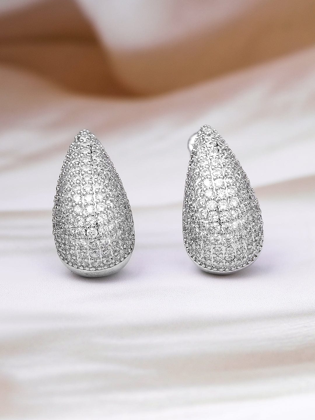 Voguish Rhodium Plated Sparkling AD & Cubic Zirconia Studded Teardrop Earrings Stud