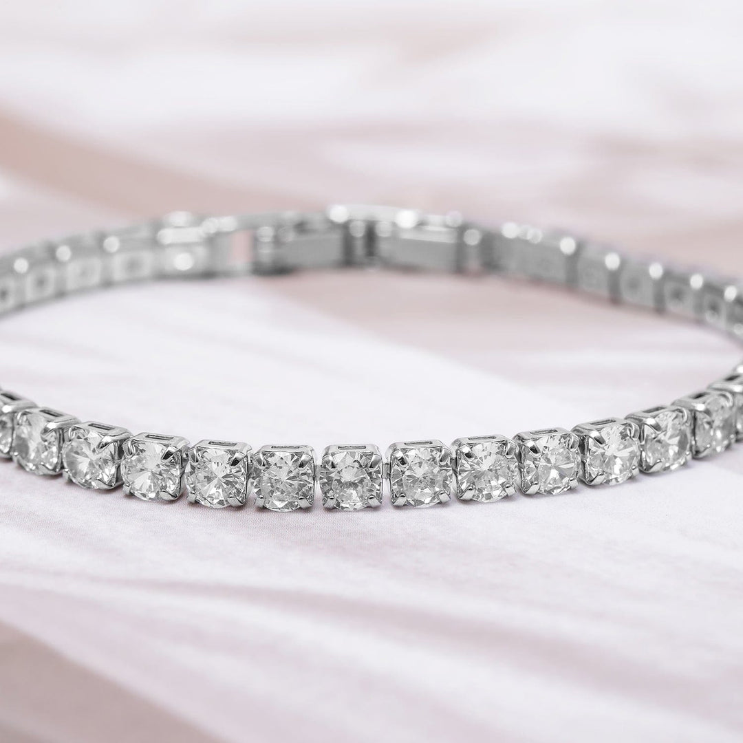 Voguish Rhodium Plated Sparkling AD & Cubic Zirconia Studded Tennis Bracelet Bracelet