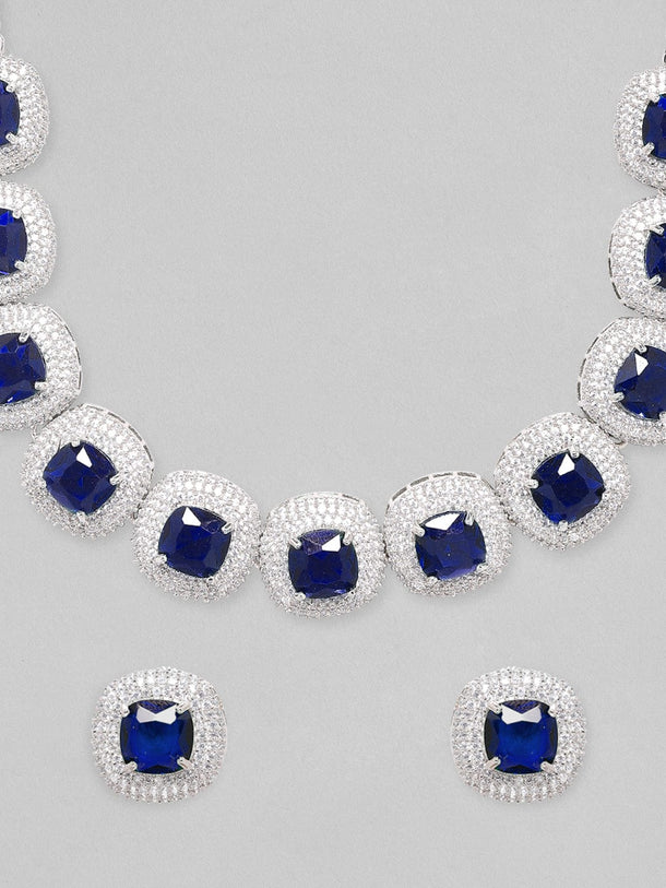 Rhodium Plated Premium white & Blue Sapphire Zircons Studded Earring and Necklace Set. Necklace Set