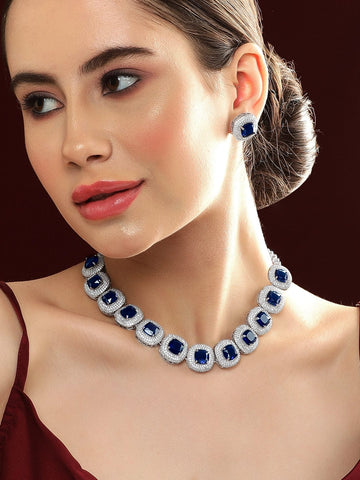 Rhodium Plated Premium white & Blue Sapphire Zircons Studded Earring and Necklace Set. Necklace Set