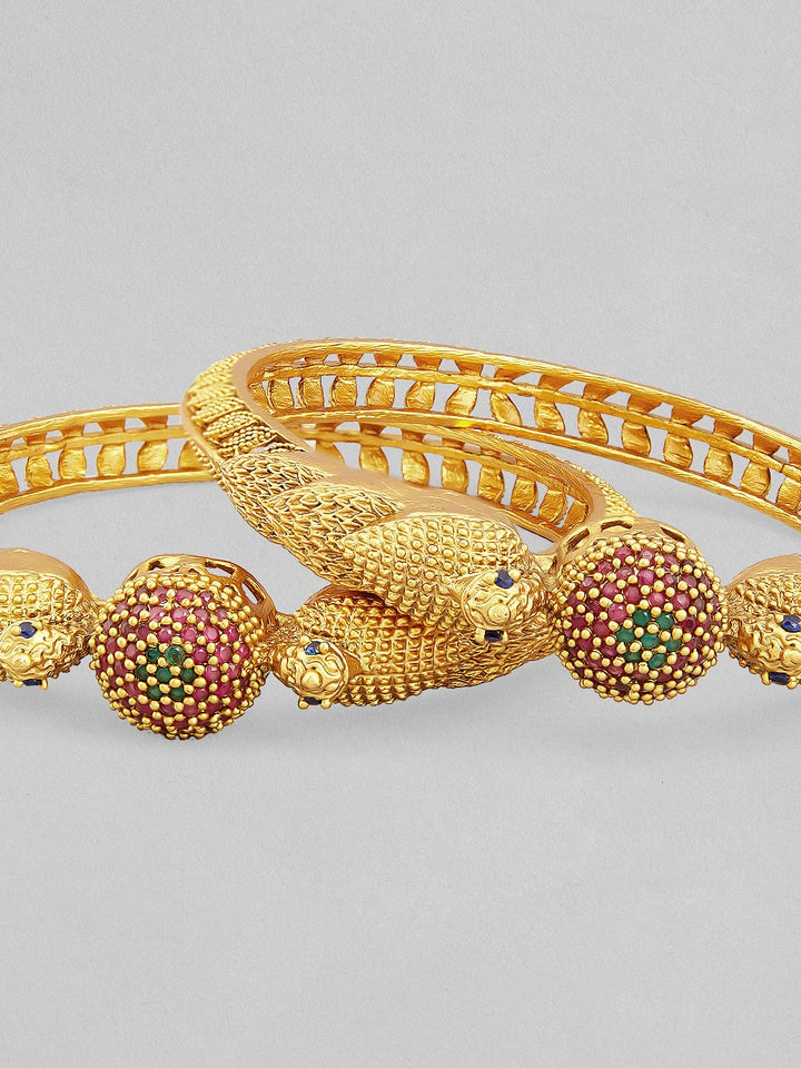 Rubans 24K gold plated bangles with temple look studded with green and pink stones. Bangles & Bracelets