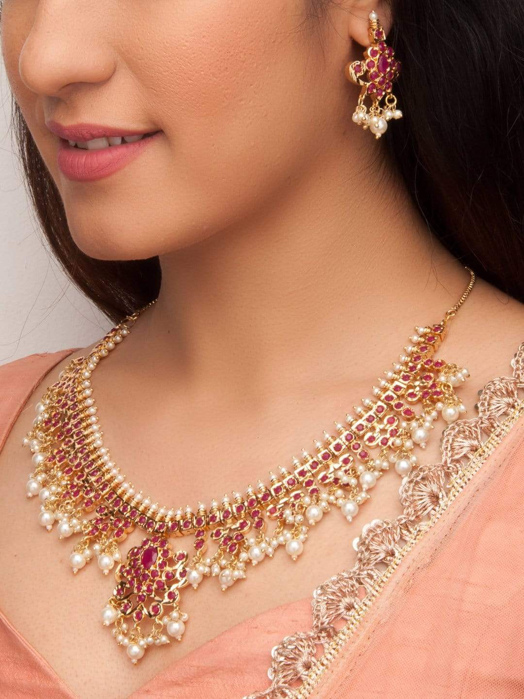 Rubans Gold Plated Traditional Faux Ruby Studded Embellished With Pearls Necklace Set Necklace Set