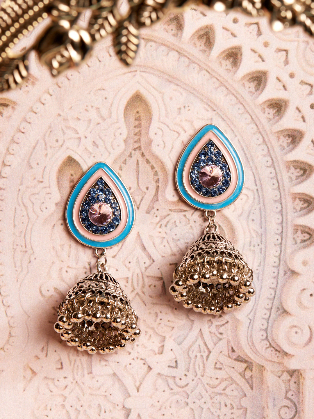 Rubans Oxidised blue and pink enameled jhumka earring. Earrings