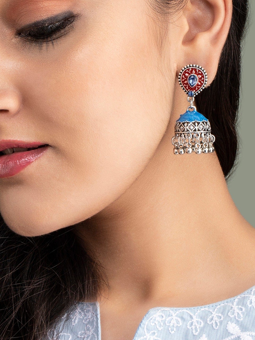 Rubans Oxidised red and blue enameled jhumka earring. Earrings