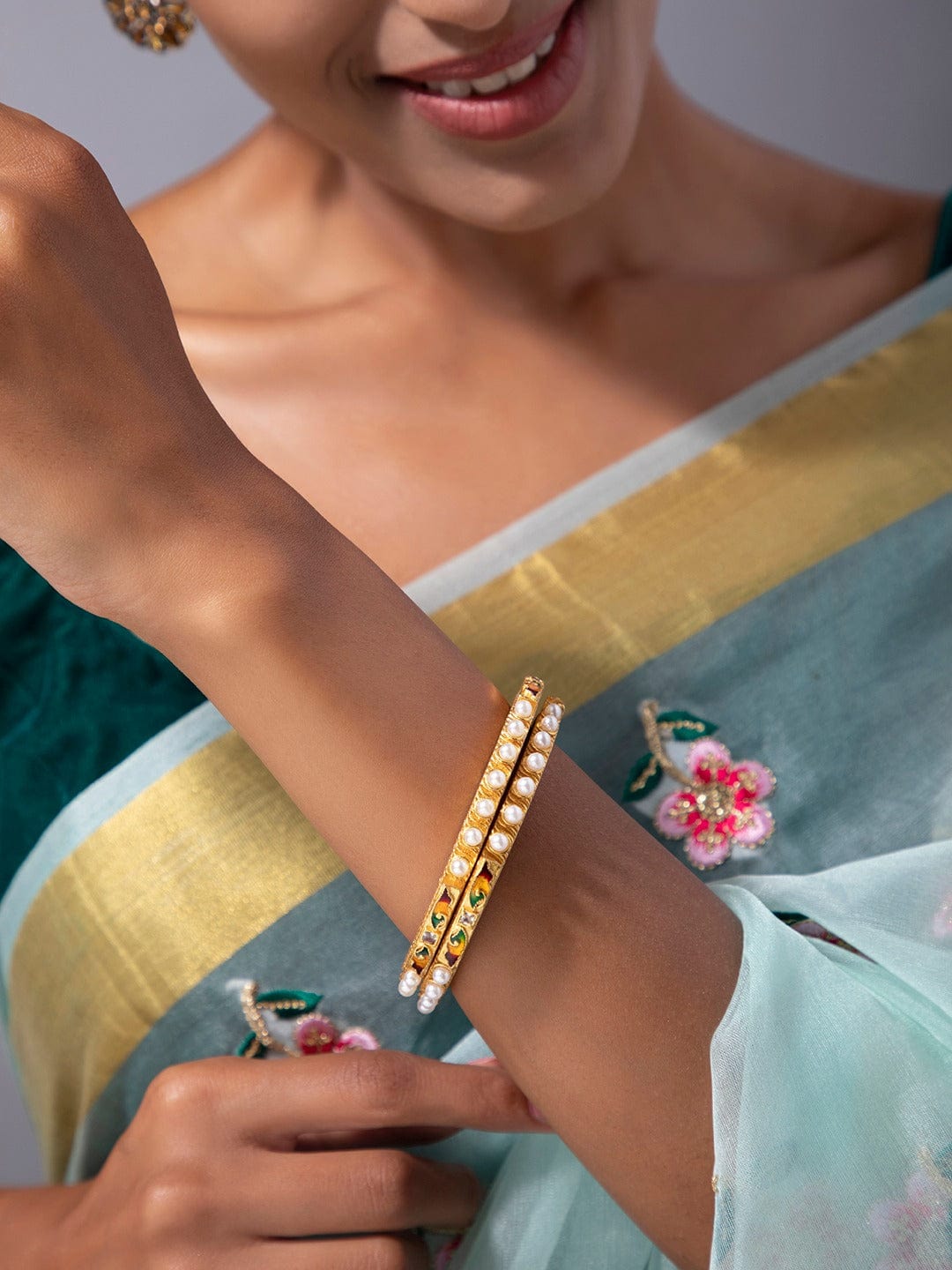 Rubans Set Of Two 22K Gold-Plated White & Green Pearl Embellished Enamelled Paheli Handcrafted Bangles Bangles & Bracelets