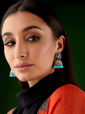 Rubans Silver Oxidised Jhumka With Studded Pink Stone And Blue Beads Earrings
