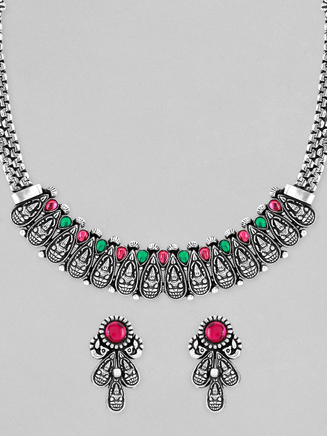 Rubans Silver Plated Oxidised Necklace Set With Red And Green Colour Stone. Necklace Set